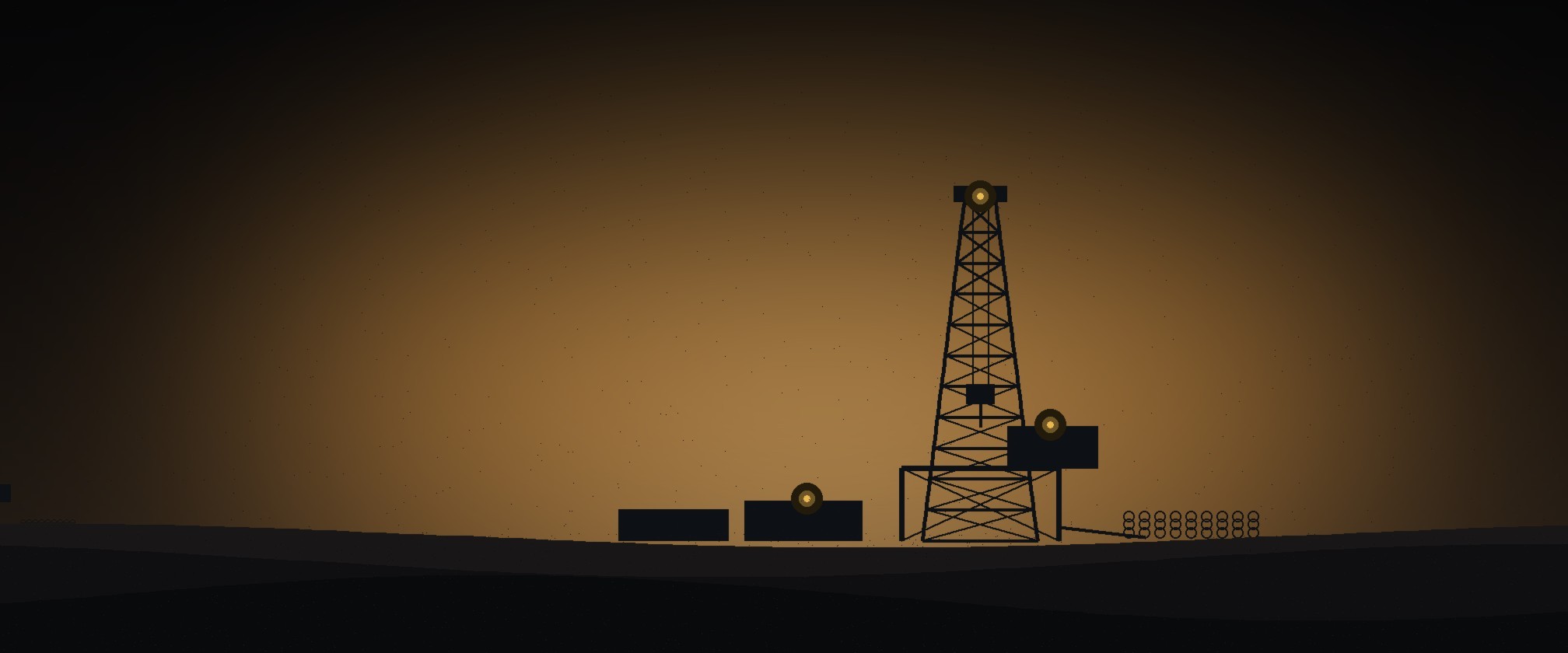 Drilling rigs at dusk